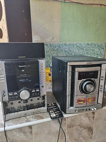 Musiqi mərkəzləri satılır: 1. **Panasonic SA-VK460** - DVD Video