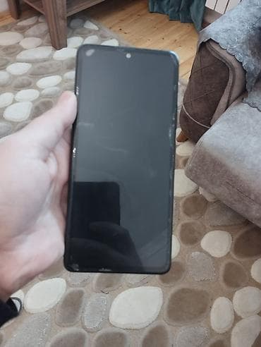 xiaomi mi a1: Smartfon – tam ekranlı, ön kamerası ekranın ortasında yerləşən deşikli — 4