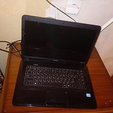hp g6: HP Compaq noutbuk - Model: Compaq (üst qapaqda Compaq loqosu, daxildə — 2