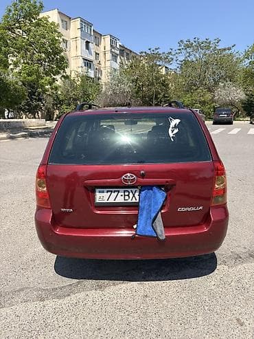 corolla toyota: Toyota Corolla Fielder, universal kuzov, qırmızı rəng. Texniki — 6