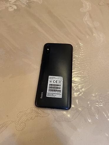 Бытовая техника: Redmi 9A, 32 ГБ, цвет - Черный, Две SIM карты — 3