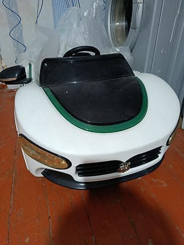 uşaq kolyaska: Uşaq elektromobili – kabriolet dizayn - Rəng: ağ/qara detallarla — 1