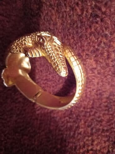 Очки: Qizil suyunda rengi getmiyen polad timsah formasında qolbaqi.cox — 3