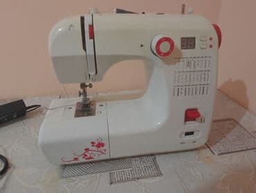 Şəxsi qulluq: Elektron tikiş maşını - Kompakt, stolüstü model; ağ korpus, qırmızı — 2