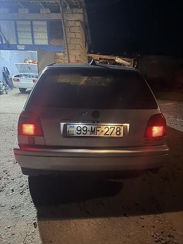 ford tranzit 1998: Volkswagen Golf (Mk3) – ağ rəngli, 5 qapılı hetçbek. Xüsusiyyətlər: - — 5