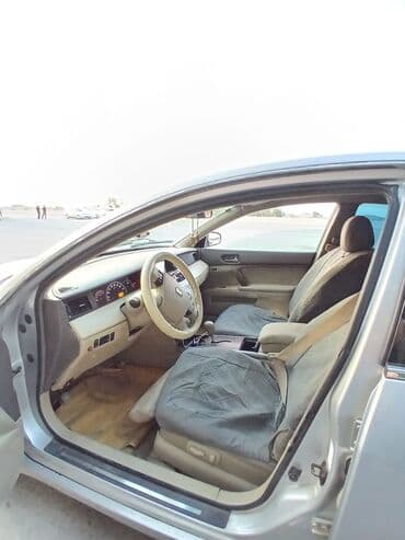 запчасти на фольксваген гольф 2: Gümüşü rəngli Nissan Teana avtomobili. Avtomobilin qabaq hissəsindəki — 5