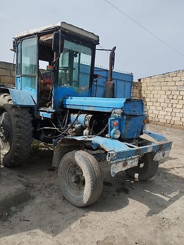 İstehsal avadanlığı: Mavi rəngli MTZ tipli təkərli traktor - Güc aqreqatı: dörd silindrli — 3