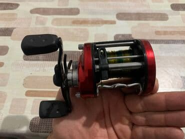 jmıx nədir: Abu Garcia Ambassadeur 6600SX multiplier reels red black. 5.3:1 gear — 8