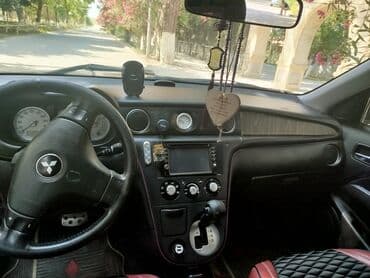 lada niva cadır: Mitsubishi Airtrek, qara rəng, universal kuzov. Xüsusiyyətlər: - — 6