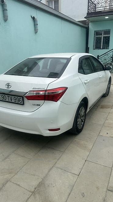 e class: Toyota Corolla: 1.6 l | 2015 il Sedan — 3