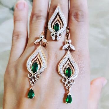 tək qaş: Dəstə daxildir: Üzük, Sırğa, Sarı qızıl, 585 Əyar, 1326 g — 2