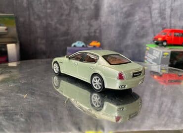 metbex tavan modelleri: Коллекционная модель Maserati Quattroporte V light green 2005 — 11