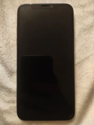 телефон fly fs521 power plus 1: IPhone X, Серебристый, Битый — 1