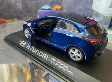 metbex tavan modelleri: Коллекционная модель Hyundai i30 5 door blue 2012 Pino B&D Scale — 24