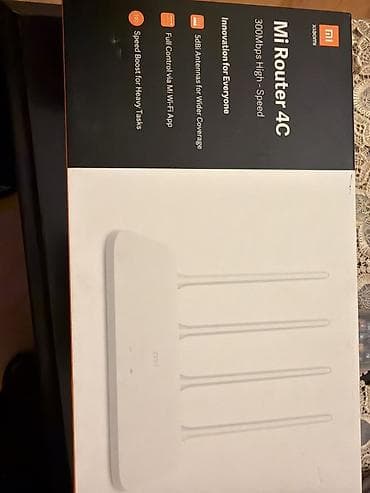 modem router: Xiaomi Mi Router 4C - Sürət: 300 Mbps (2.4 GHz) - 4 ədəd 5 dBi antena — 1