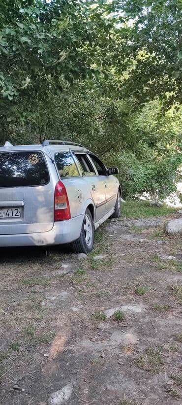 xanımlar ucun maşınlar: Opel Astra: 1.6 l | 1998 il Universal — 4