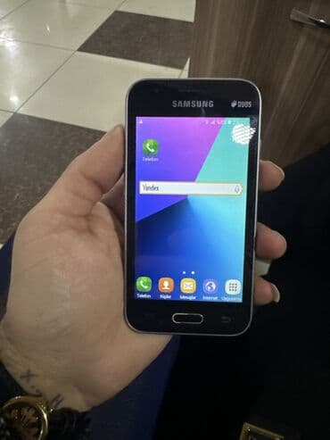 ВАЗ (ЛАДА): Samsung Galaxy J1, 4 ГБ, цвет - Черный, Две SIM карты — 2