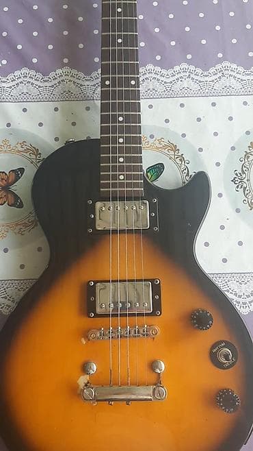 akustik gitara satisi: Elektrik gitara – Les Paul tərzi, sunburst rəg. Xüsusiyyətlər: - — 1