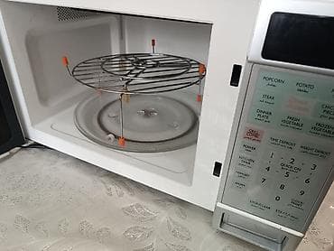 par utuleri: SANYO Cook ‘n’ Grill mikrodalğalı soba Xüsusiyyətlər: - 1 100 W güc — 2
