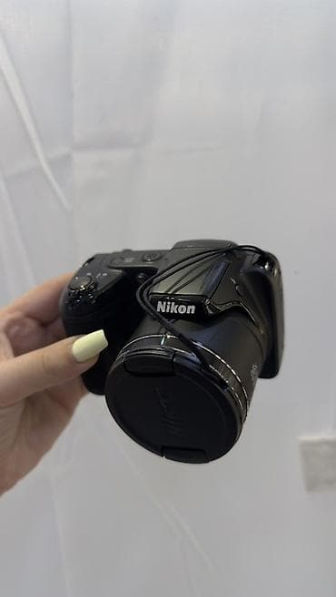 nikon d5200: Nikon rəqəmsal fotoaparat – kompakt “bridge” tipli model - İnkişaf — 1