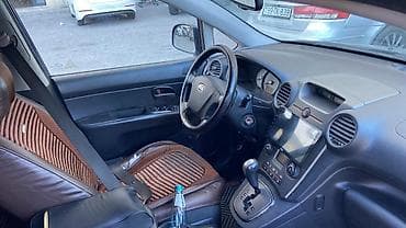 Aksesuarlar və tüninq: Kia Carens CRDi – dizel, avtomat - Kuzov: tünd mavi, 5 qapı — 3