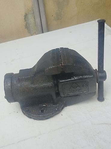 Metalkəsən dəzgahlar və emalatxanalar üçün bərkidici metal mengə