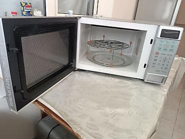 par utuleri: SANYO Cook ‘n’ Grill mikrodalğalı soba Xüsusiyyətlər: - 1 100 W güc — 3