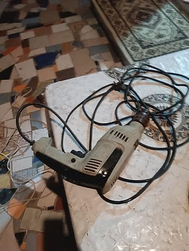 Elektrikli şnurla işləyən zərbəli/qulplu matkap - Güc mənbəyi: 220V at lalafo.az Elektrikli şnurla işləyən zərbəli/qulplu matkap - Güc mənbəyi: 220V