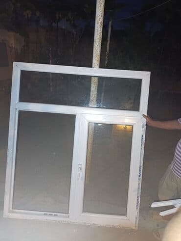 qapı və pəncərələr: Bu ağ rəngli PVC pəncərə iki şüşəli, iki hissəli dizayna malikdir — 2