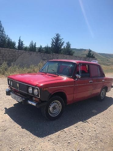 larzon disk: VAZ 2106, qırmızı rəngli, sedan kuzov. Xüsusiyyətlər: - 4 qapı, 5 — 2