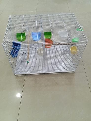 islenmis akvarium satisi: Iki hissəli 60×40×40 ölçüdə qəfəs,9 yem 2 su qabısıda üstündə — 2