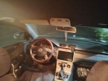 volkswagen golf vii: Volkswagen Passat: 2 л | 2006 г. Универсал — 6