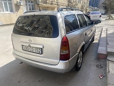 fiat brava 2001: Opel Astra Caravan (universal) – benzinli, avtomatik ötürücülü ailə — 7