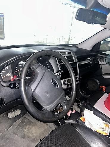 opel astra kompressor: Kia Sportage: 2 l | 2007 il Krossover — 4