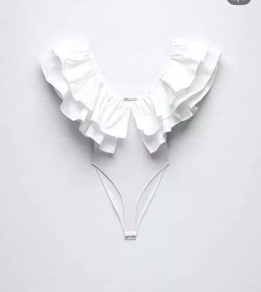 Zara body bluz tezedir geyilmeyib 
L razmerdir