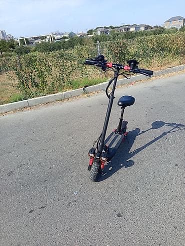 Elektrik nəqliyyatı: 2026buraxilis sukuterdir teptezeteker 1aydiki alinib tecili satilir — 2