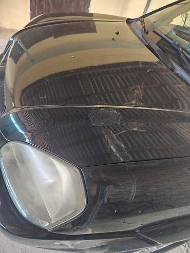 larzon disk: Hyundai Tucson CRDi – dizel, avtomat, qara rəngli kompakt SUV. Əsas — 5