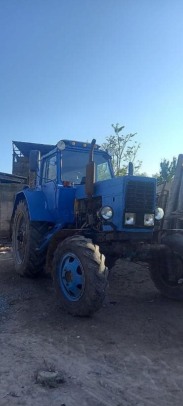 traktor teker: Mavi rəngli təkərli traktor Texniki xüsusiyyətlər və təyinat: - Ön və — 3