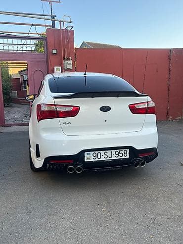 kia rio 2011: Kia Rio: 1.4 l | 2013 il Sedan — 2