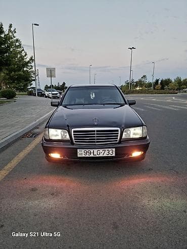 1994 bmw 320: Mercedes-Benz C-Class: 2.2 l | 2000 il Sedan — 5