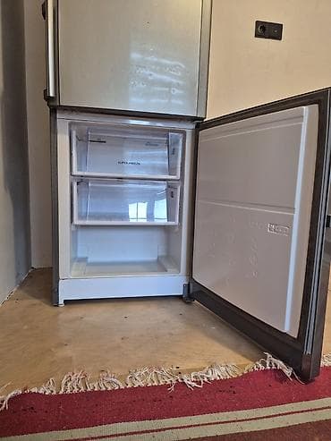 maqnitola satilir: 2 qapılı Hotpoint Ariston Soyuducu Satılır, rəng - Boz — 1