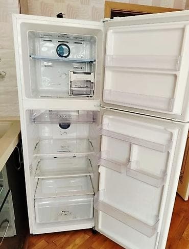 Elektronika: Ağ rəngdə təkqapılı məişət soyuducusu. Xüsusiyyətlər: - Üst hissədə — 2