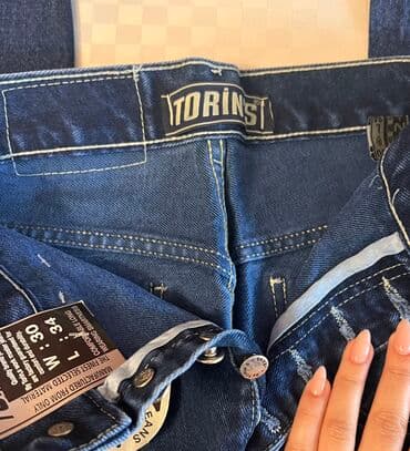 Toy paltarları və aksesuarları: Djins. Alman malı. Ölçülər: Taliya 58-70 sm. Hündürlük: 1,30 Təzə — 2