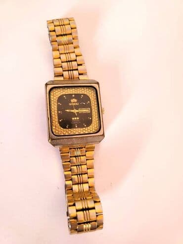 el fecr saat: İşlənmiş, Qol saatı, Orient, rəng - Qızılı — 2