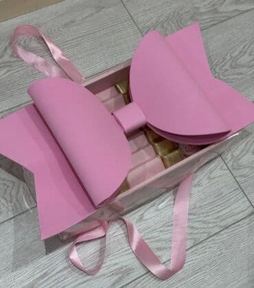 Qutunu və içərisində olan şokoladları istəyə uygun