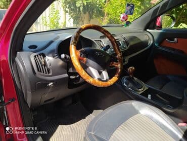 qadın üçün maşınlar: Kia Sportage: 2 l | 2011 il Ofrouder/SUV — 4