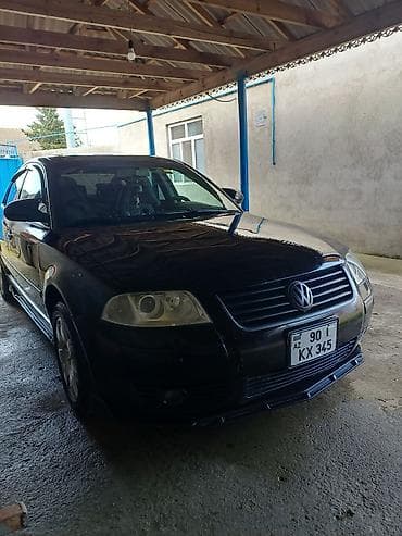 kia optima spoyler: Volkswagen Passat: 1.8 l | 2004 il Sedan — 2