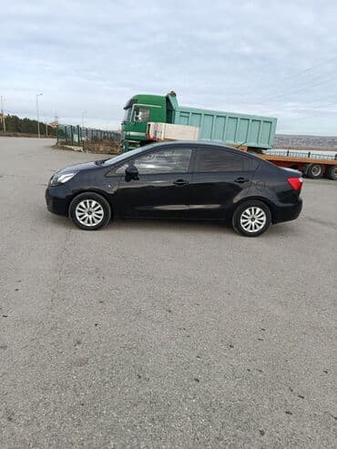 kvadrasikl satisi: Kia Rio sedan – qara rəng, 4 qapılı, kompakt şəhər avtomobili satılır — 3
