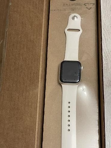 su despensoru: Apple Watch SE (2-ci nəsil, 40mm GPS + Cellular) – Alüminium korpus — 2