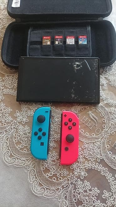 Nintendo Switch: Satılır Nintendo Switch konsol set: Nintendo Switch Konsol + 4 Oyun + — 2